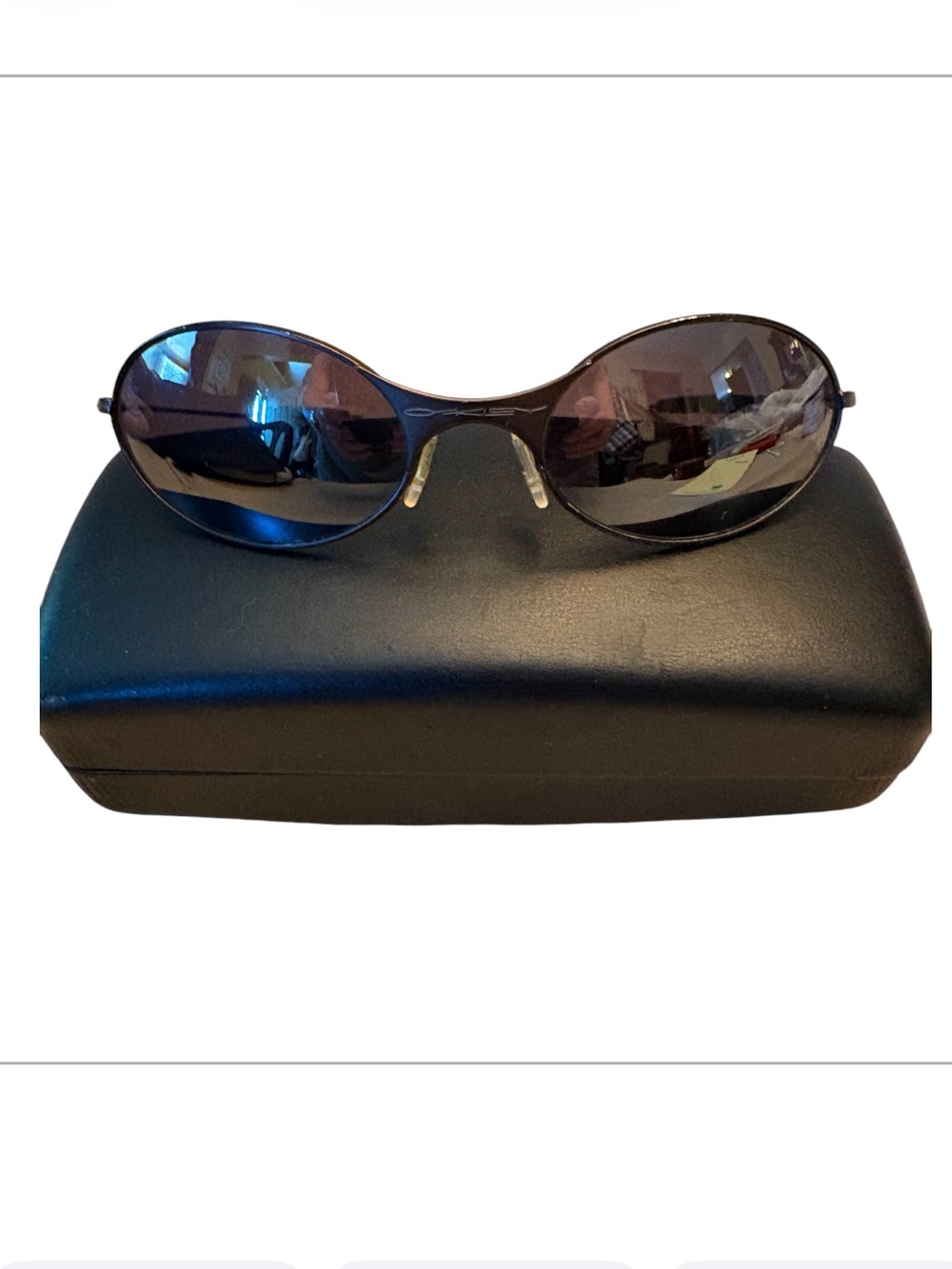 Vintage Oakley E-Wire sunglasses from the 1990s.